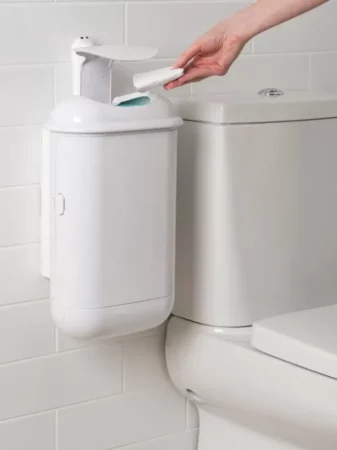 Woman using a sanipod unit